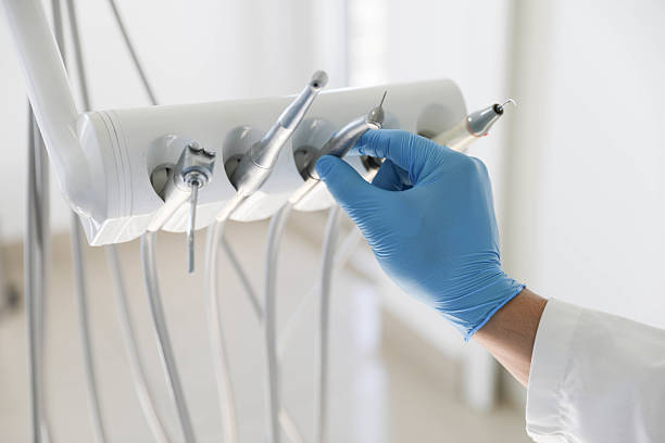 Professional Emergency Dentist technician working in Gloversville, NY